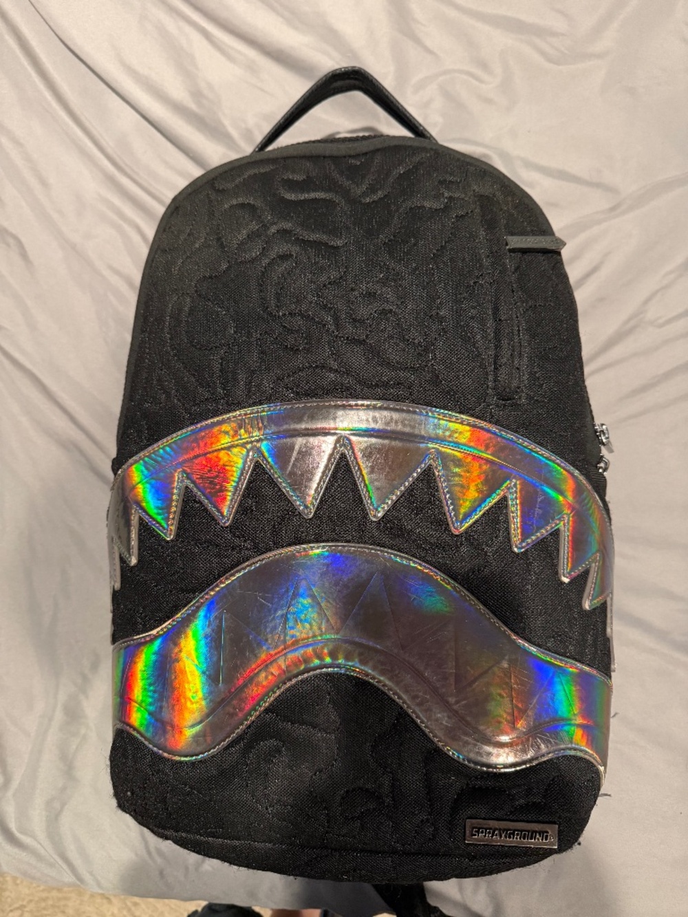 Sprayground Black Quilted Irridescent DLXs Backpack